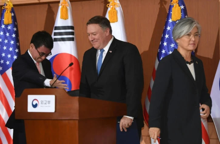 Le secrétaire d'Etat américain Mike Pompeo (au centre) avec les ministres des Affaires étrangères japonais Taro Kono et sud-coréenne Kang Kyung-wha, le 14 juin 2018 à Séoul