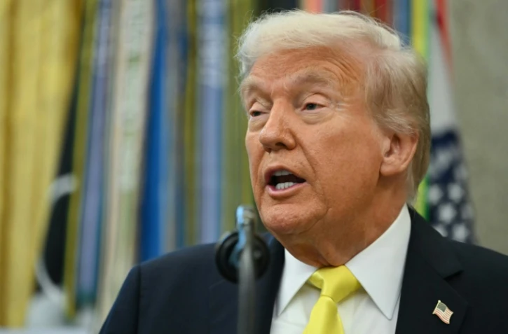 Le président américain Donald Trump dans le Bureau ovale de la Maison Blanche, le 15 octobre 2025 à Washington