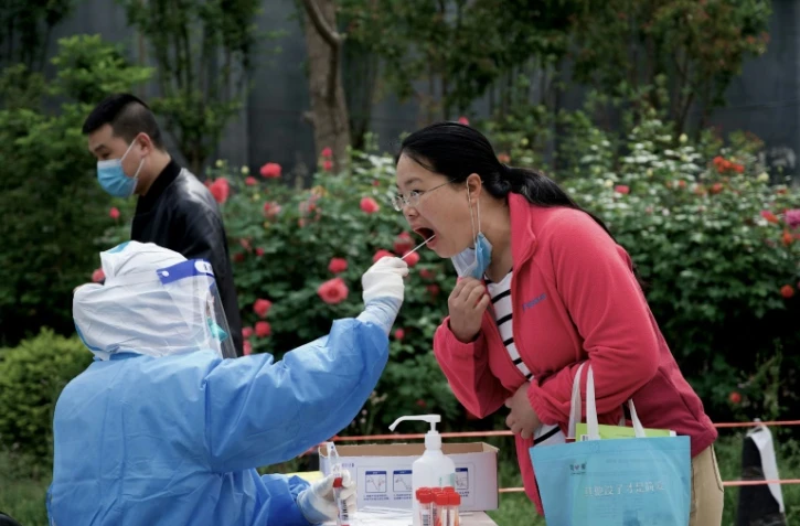Dépistage du Covid-19 à Pékin, le 9 mai 2022