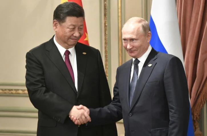 Les présidents chinois Xi Jinping et russe Vladimir Poutine lors d'une rencontre bilatérale en marge d'un sommet du G20 à Buenos Aires, le 30 novembre 2018