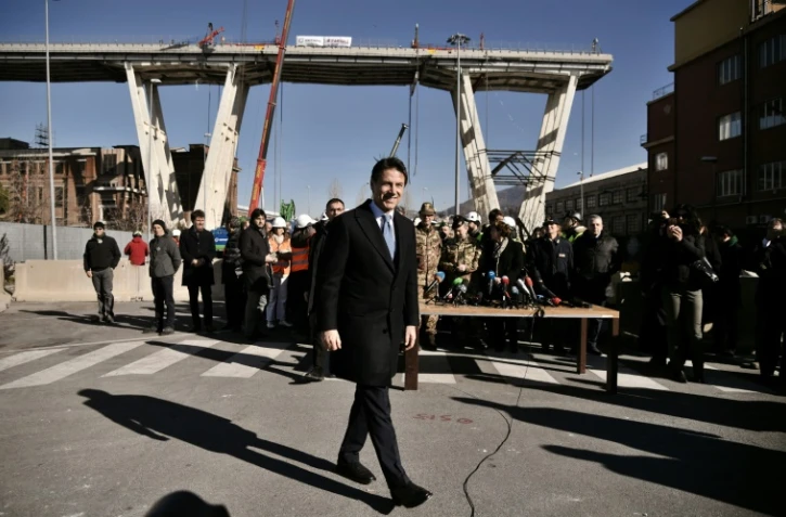 Le Premier ministre italien Giuseppe Conte à Gênes sur le site du pont effondré le 8 février 2019