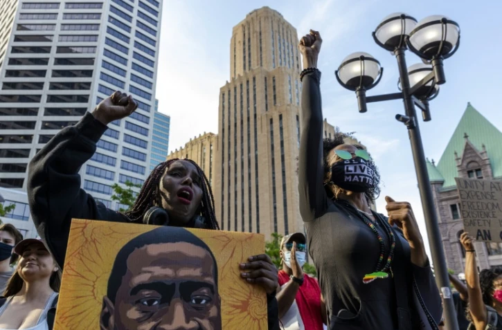 Manifestantes aux commémorations de la mort de George Floyd, à Minneapolis (Minnesote), le 23 mai 2021