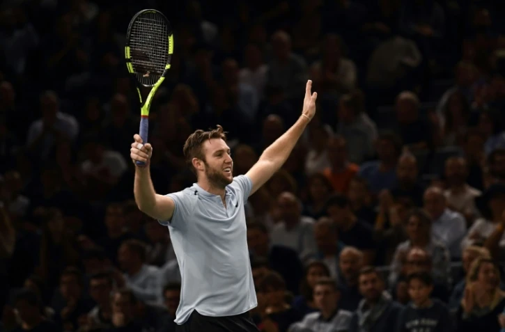 L'Américain Jack Sock bras levés après sa victoire face au Français Julien Benneteau au Masters 1000 de Paris-Bercy , le 4 novembre 2017