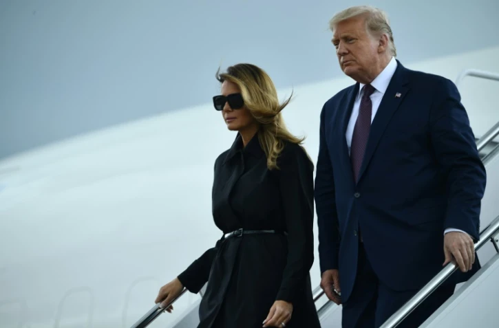 Donald Trump et la Première dame Melania à leur descente de l'avion présidentiel Air Force One, le 11 septembre