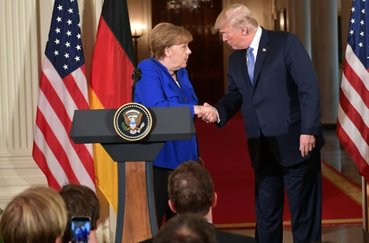 La chancelière allemande Angela Merkel et le président américain Donald Trump lors d'une conférence de presse, le 27 avril 2018 à la Maison Blanche, à Washington