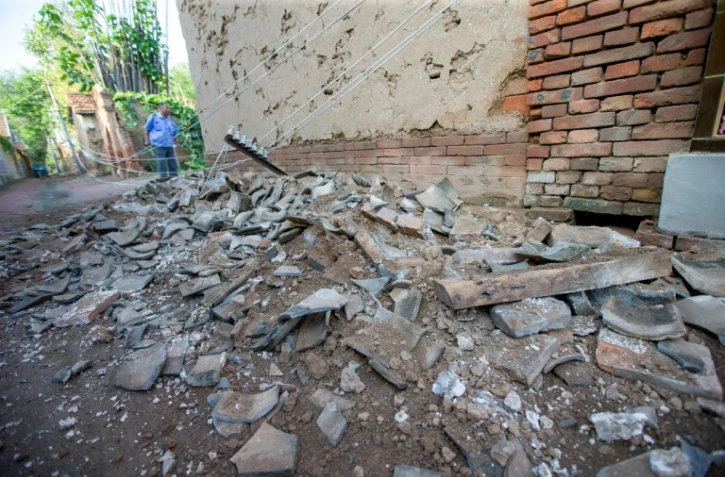 Une habitation endommagée après un séisme, le 6 août 2023 dans la localité de Dezhou dans l'est de la Chine 