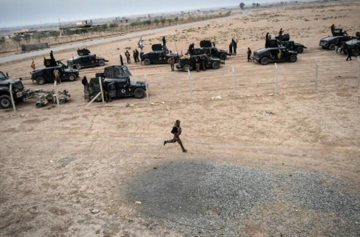 Des membres du service anti-terroriste irakien près du village de Bazwaya, à l'est de Mossoul, le 31 octobre 2016