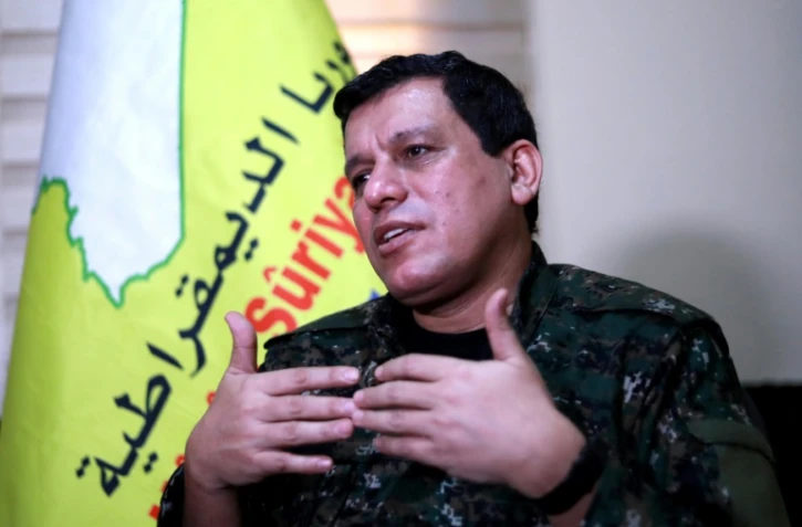 Mazloum Kobani, commandant en chef des Forces démocratiques syriennes lors d'une interview exclusive avec l'AFP, près de la ville de Hassaké dans le nord de la Syrie, le 24 janvier 2019