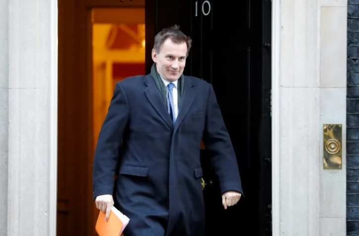 Le ministre britannique des Affaires étrangères Jeremy Hunt sort du 10 Downing Street, le 22 janvier 2019 à Londres