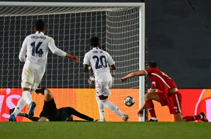Le Brésilien Vinicius Jr crucifie la défense de Liverpool pour le 3e but du Real Madrid en quart de finale de C1 au stade Alfredo di Stefano, le 6 avril 2021
