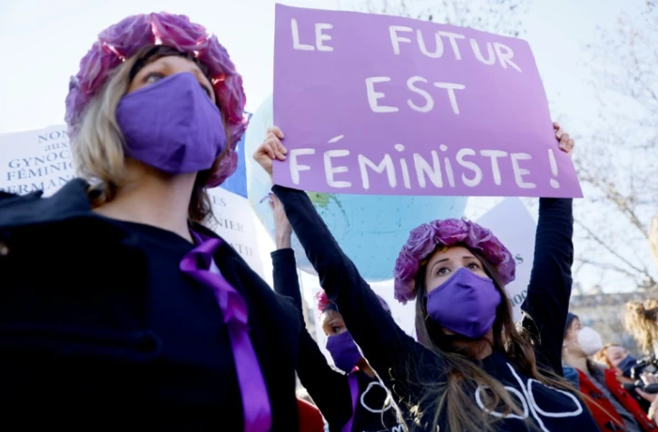 Des militantes Femen partipent à une manifestation en faveur des droits des femmes place de la République à Paris, le 7 mars 2021 