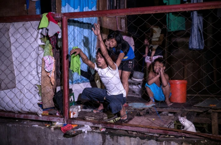 Douleur des proches d'un trafiquant de drogue présumé tué aux Philippines, à Manille, le 4 janvier 2017