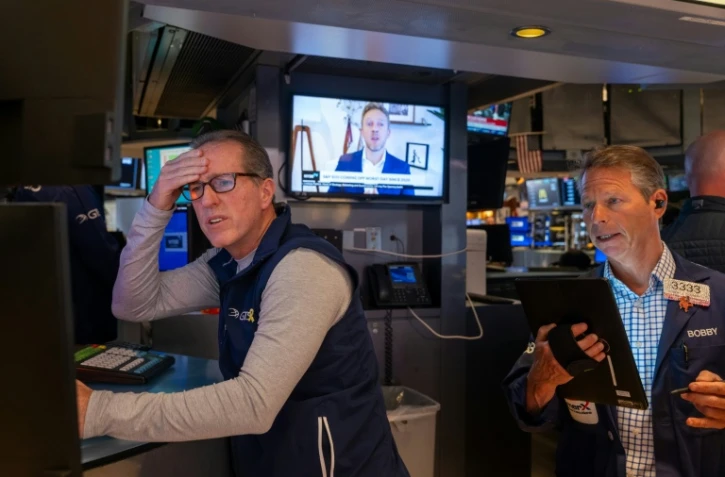Traders à Wall Street, sur le parquet de la Bourse de New York le 4 avril 2025