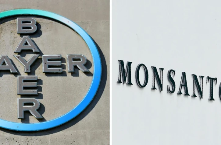 Les logos des entreprises Bayer et Monsanto