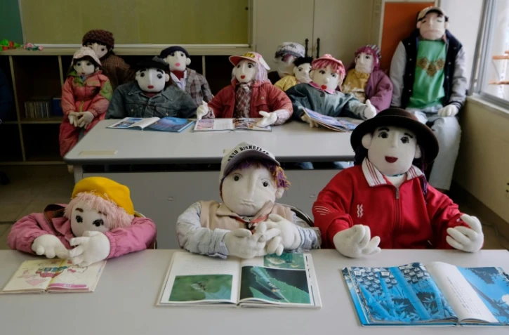 Des "écoliers" de chiffon, fabriquées par une grand-mère japonaise pour "repleupler" son village de Nagoro, le 16 mars 2019