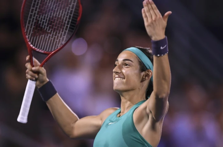 La joie de la Française Caroline Garcia après sa victoire face à la Russe Maria Sharapova au 3e tour du tournoi de Montréal, le 9 août 2018