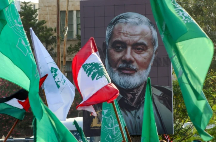 Manifestation en hommage au chef du Hamas assassiné, Ismaïl Haniyeh, et au commandant militaire du Hezbollah tué dans une frappe israélienne, dans la ville de Sidon, au sud Liban, le 2 août 2024