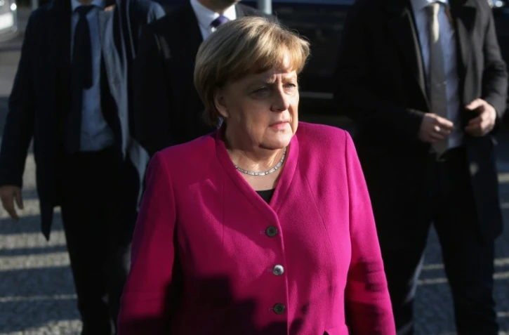 La chancelière allemande Angela Merkel arrive pour de nouvelles discussions sur la formation d'un gouvernement, le 6 février 2018 à Berlin