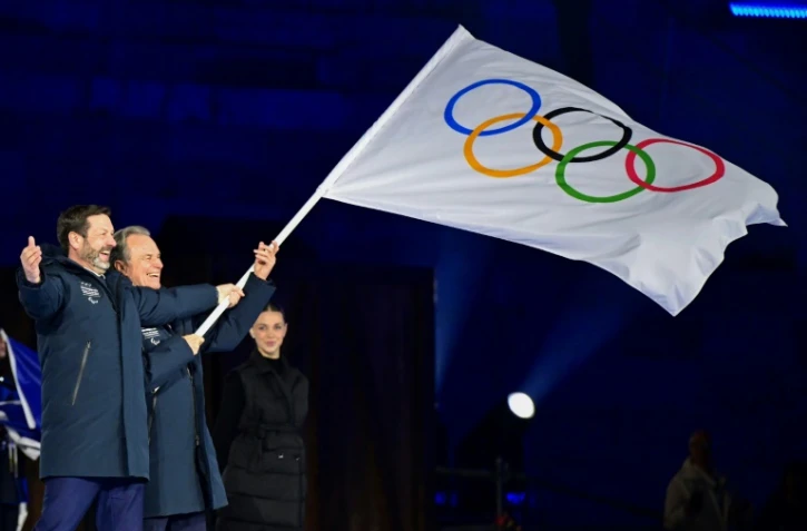 Les présidents des régions Auvergne-Rhône-Alpes, Fabrice Pannekoucke (g) et
Provence-Alpes-Côte d’Azur, Renaud Muselier, hôtes des Jeux d'hiver 2030, lors de la cérémonie de clôture de JO de Milan Cortina, le 23 février 2026 à Vérone