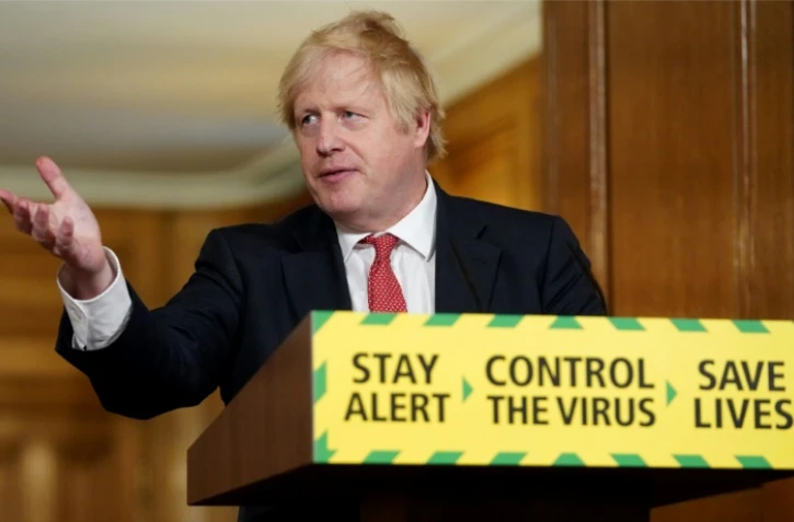 Photo fournie par les services du Premier ministre de Boris Johnson, lors d'une conférence de presse tenue depuis sa résidence au 10 Downing Street, le 11 mai 2020