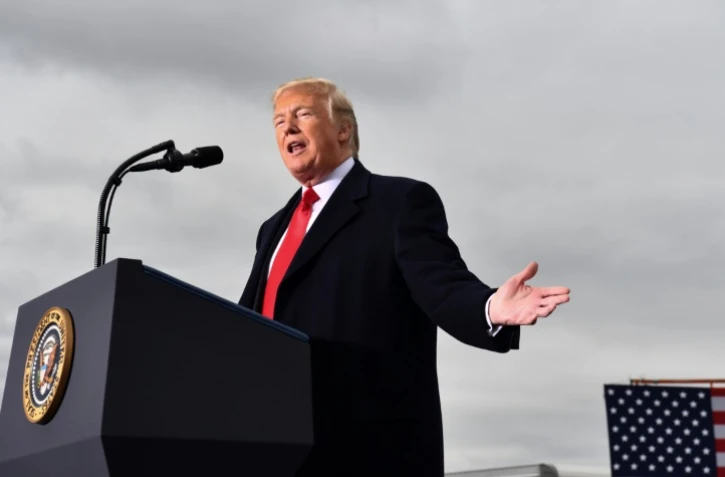 Le président des Etats-Unis Donald Trump a fait de l'immigration le coeur de sa campagne pour les élections de mi-mandat, comme ici lors d'un meeting à Huntington (Virginie Occidentale), le 2 novembre 2018.