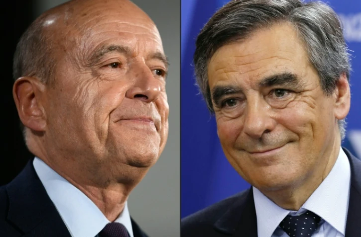 Alain Juppé (g) et François Fillon, le 20 novembre 2016 à Paris
