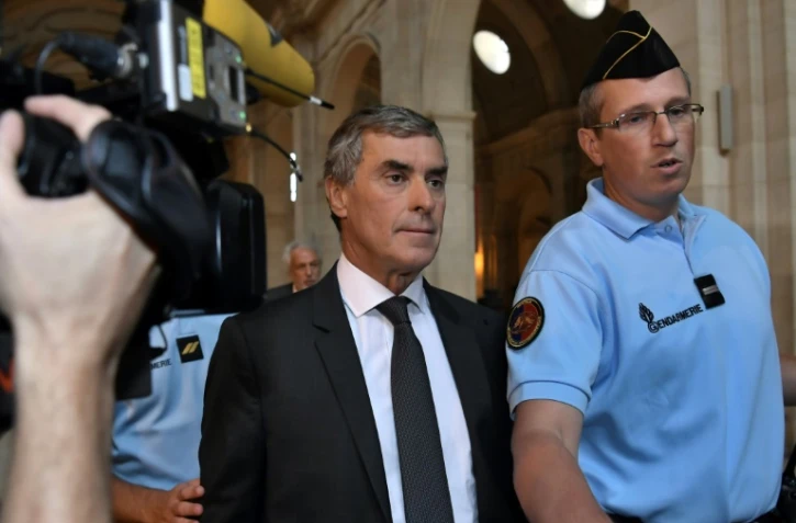 Jérôme Cahuzac (c) au palais de justice de Paris, le 5 septembre 2016