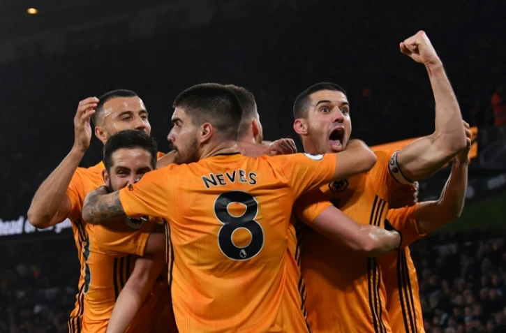 Les joueurs des Wolverhampton Wanderers fêtent le 3e but de leur équipe contre Manchester City, le 27 décembre 2019 au stade Molineux à Wolverhampton.