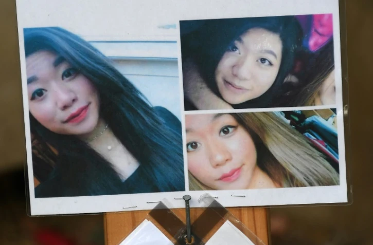 Photo prise le 20 septembre 2018 montrant des messages et des portraits de l'étudiante Sophie Le Tan disparue le 7 septembre près de Strasbourg
