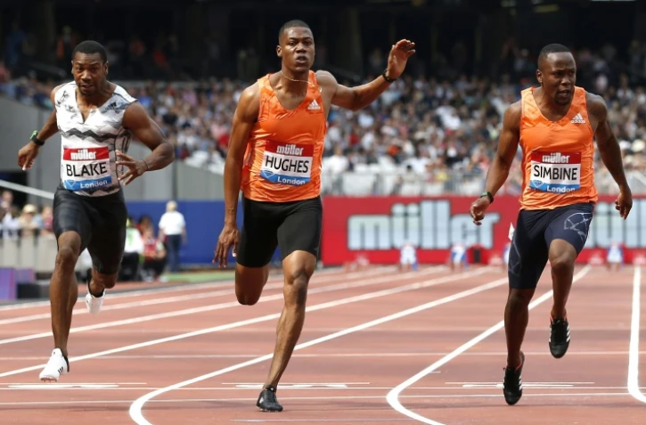 Le Britannique  Zharnel Hughes (c) sur 100 m à Londres, le 21 juillet 2018