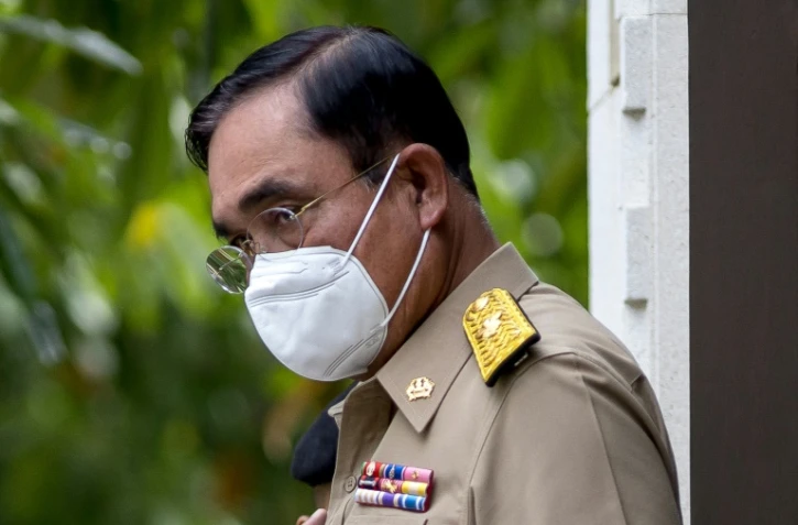 Le Premier ministre thaïlandais Prayut Chan-O-Cha, suspendu par la Cour constitutionnelle le 24 août 2022, traverse la Maison du gouvernement à Bangkok le 22 août 2022