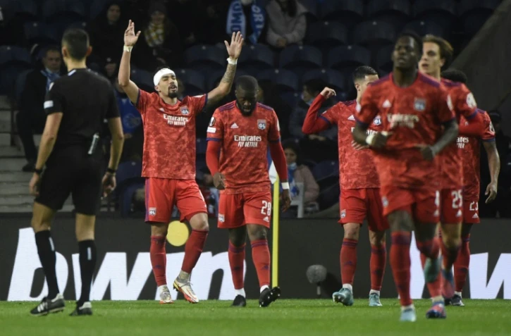 La joie du milieu de terrain brésilien de Lyon, Lucas Paqueta, après avoir ouvert le score contre Porto, lors du 8e de finale aller de la Ligue Europa, le 9 mars 2022 au Stade du Dragon