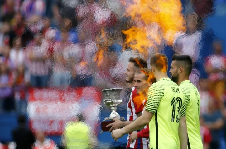 L'Atlético d'Antoine Griezmann, ici lors de la cérémonie d'adieux à son stade madrilène Vicente-Calderon, le 21 mai 2017, reste interdit de recrutement