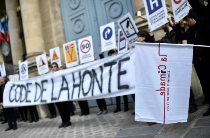 Manifestation à l'appel de la Cimade contre le projet de loi asile et immigration, le 16 avril 2018 devant l'Assemblée nationale, à Paris