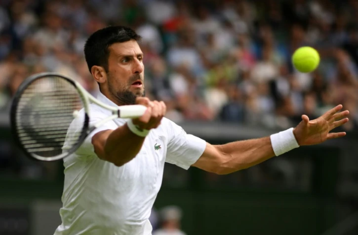 Le Serbe Novak Djokovic au cours de son quart de finale de Wimbledon contre le Russe Andrey Rublev le 11 juillet 2023 à Londres