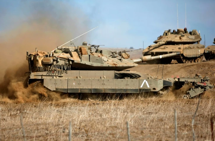 Un char israélien participe à des manoeuvres sur le Golan occupé à la frontière avec la Syrie, le 20 novembre 2017