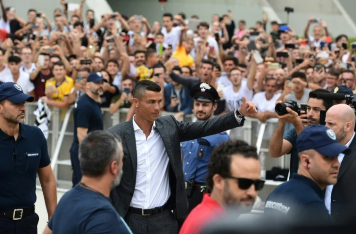 L'attaquant vedette du Portugal Cristiano Ronaldo arrive au centre médical de la Juventus à Turin, le 16 juillet 2018  