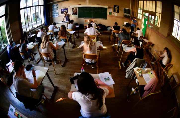 Des lycéens lors de l'épreuve de philosophie du baccalauréat dans un lycée de Paris, le 15 juin 2017