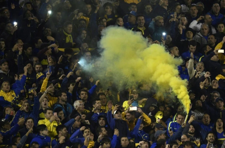 Les supporters de Boca Juniors enouragent leur équipe lors du match de la Copa Libertadores contre Alianza Lima à la "Bombonera", le 16 mai 2018