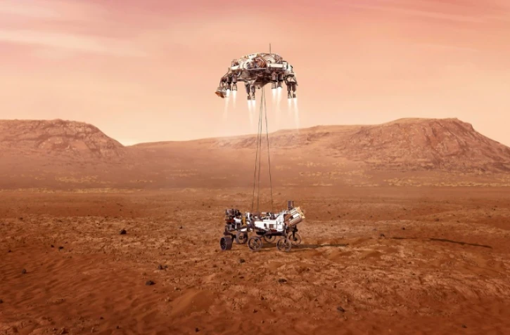 Illustration fournie le 16 février 2021 par la Nasa du rover Perseverance au moment de son atterrissage sur Mars