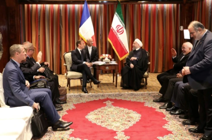 Emmanuel Macron discute avec son homologue iranien Hassan Rohani, à New-York, lors d'une rencontre en marge d'une Assemblée générale de l'Onu, le 18 septembre 2017