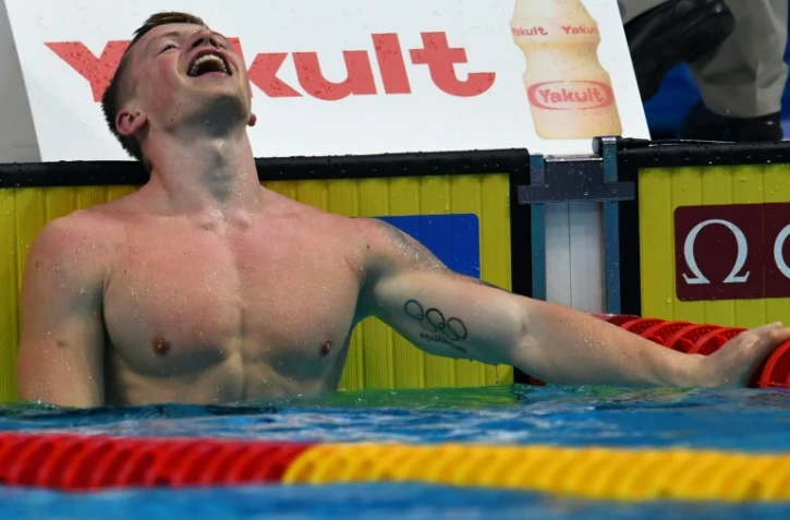 Le Britannique Adam Peaty après avoir battu son propre record du monde du 50 m brasse, en demi-finale des Mondiaux, le 25 juillet 2017 à Budapest