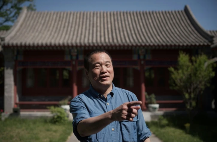 Huang Nubo le 6 mai 2016 devant l'Institut de recherche sur la poésie chinoise, à Pékin