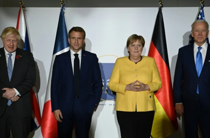 (de g à d) Le Premier ministre britannique Boris Johnson, le président français Emmanuel Macron, la chancelière allemande Angela Merkel et le président américain Joe Biden à Rome, le 30 octobre 2021