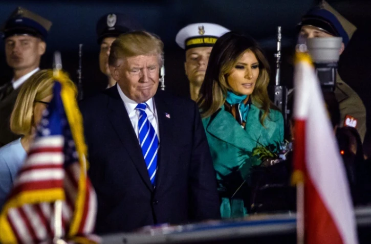 Le président américain Donald Trump (g) et son épouse Melania (d) à leur arrivée à Varsovie, le 5 juillet 2017