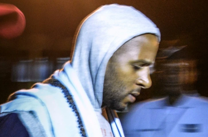 Peter Cherif lors de son extradition vers la France, à l'aéroport international de Djibouti, le 22 décembre 2018