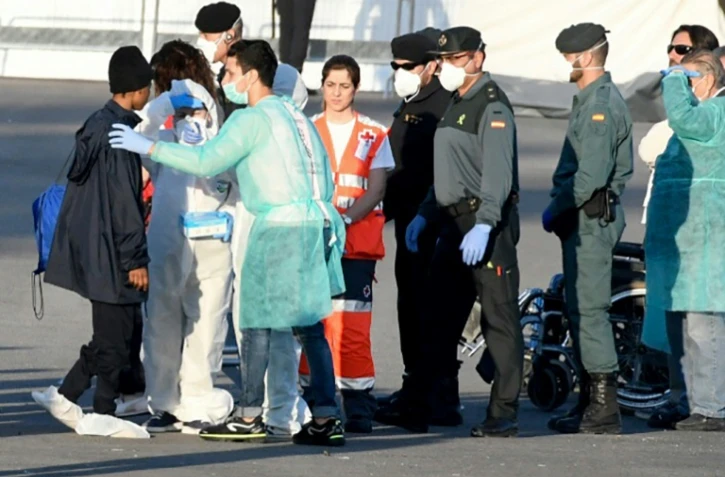 Un migrant arrive au port de Valence en Espagne le 17 juin 2018