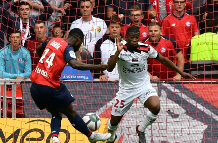Le milieu de terrain de Lille Jonathan Bamba (g) buteur lors de la réception de Guingamp à Villeneuve d'Ascq le 26 août 2018