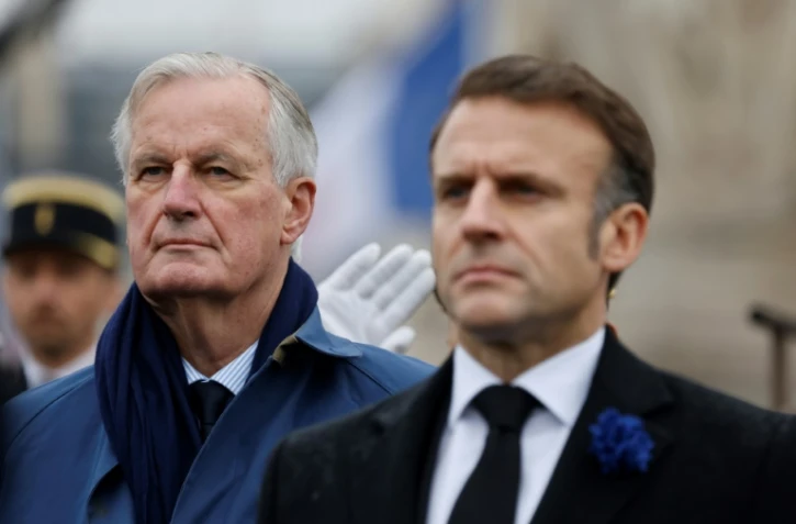 Michel Barnier et Emmanuel Macron lors des commémorations du 11-Novembre, le 11 novembre 2024 à Paris