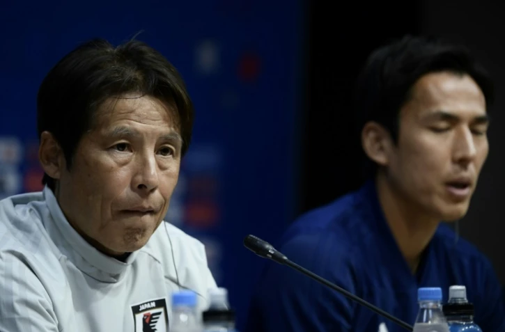 Le sélectionneur du Japon Akira Nishino (g) et le capitaine de l'équipe Makoto Hasebe en conférence de presse, le 18 juin 2018 à Saransk